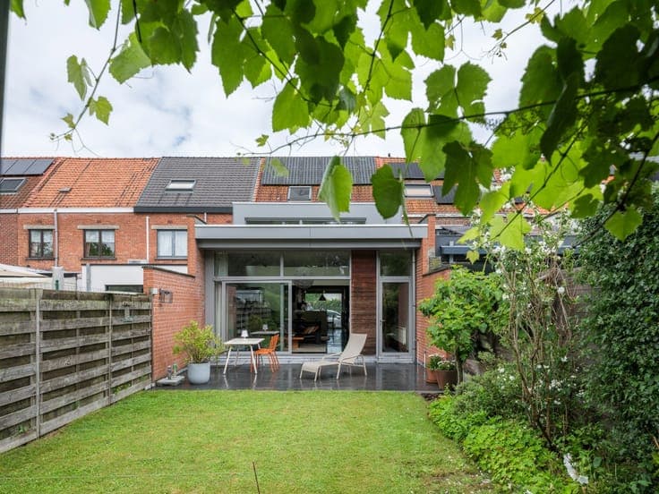 Turnkey home with abundant light and beautiful garden exper