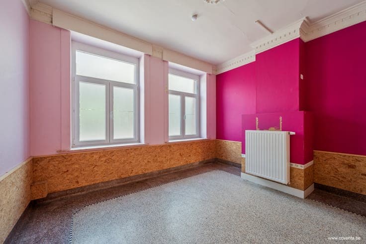 Te koop – Gezinswoning met tuin en uitweg in het hart van...