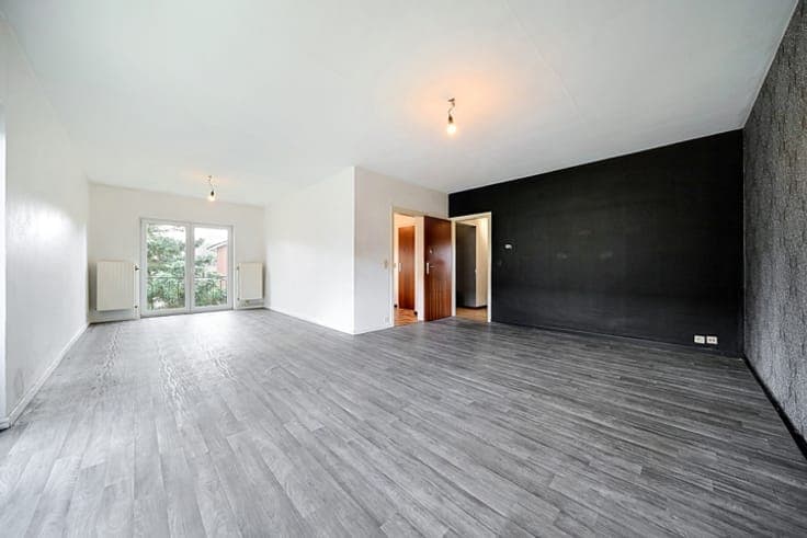 4-Bedroom Split-Level House with Garage and Garden
