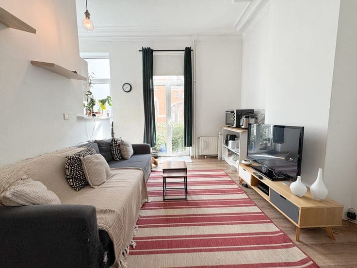 SINGLE-FAMILY HOUSE CONVERTED INTO 5 APARTMENTS