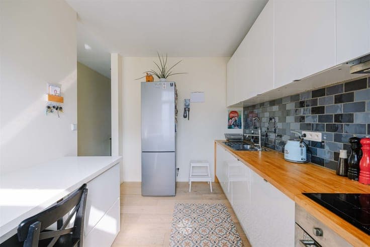 Instapklare woning met drie slaapkamers en gezellig koertje