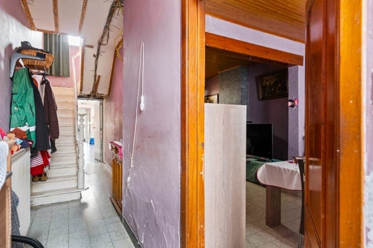 Rustig & centraal gelegen te renoveren rijwoning met 3 SL...