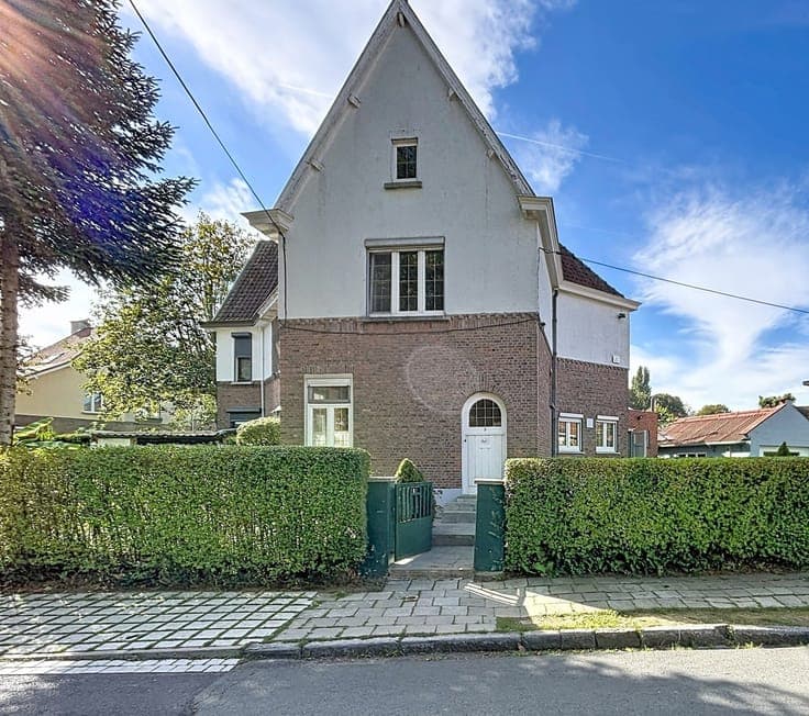 Maison 3 façades avec jardin et garage