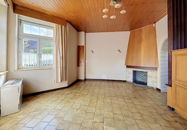 Maison 3 façades avec jardin et garage