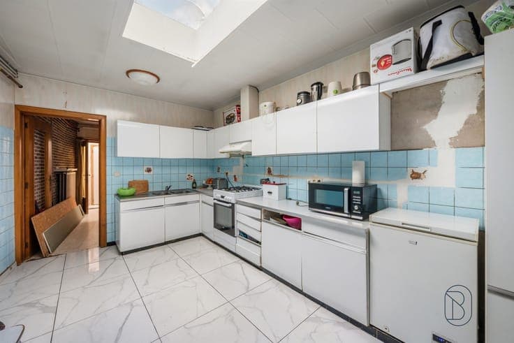 Spacious family home with a garden, terrace, and panoramic v