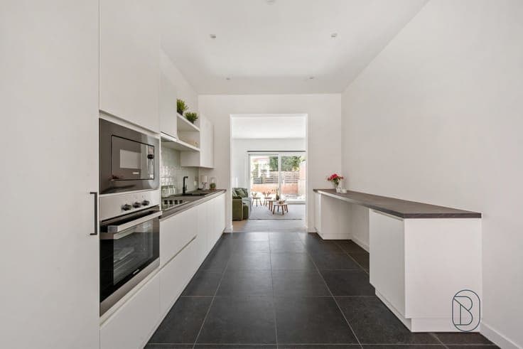 A nicely renovated home in a great location with a city gard