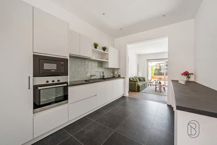 A nicely renovated home in a great location with a city gard