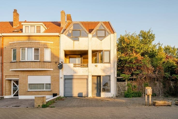 Op te frissen woning met perceel bouwgrond