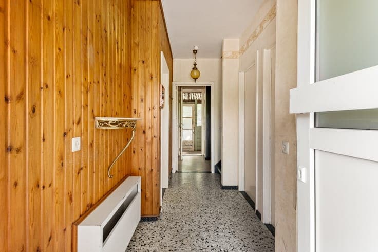 Te renoveren woning met 3 slpk., garage en tuin