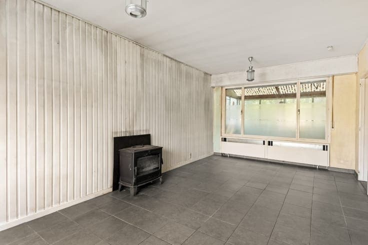 Te renoveren woning met 3 slpk., garage en tuin