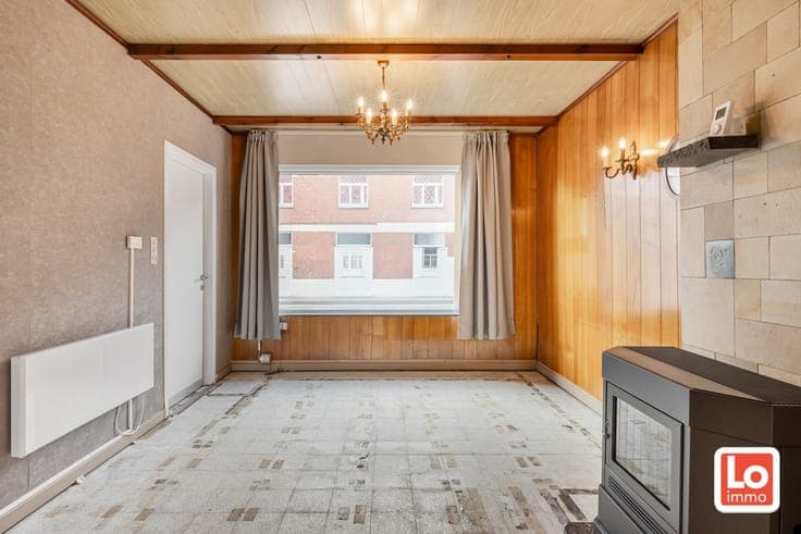 Gesloten woning met gezellige stadstuin op een vlot berei...