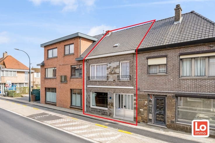 Gesloten woning met gezellige stadstuin op een vlot berei...
