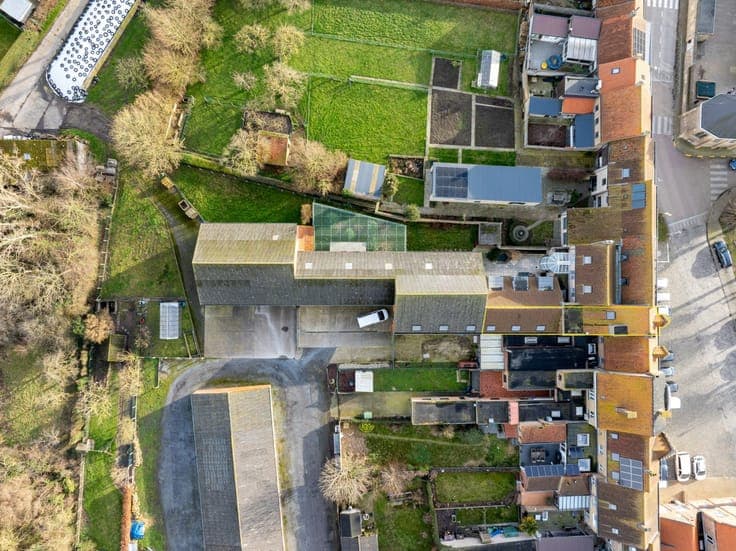 Residential property with commercial space in the center of