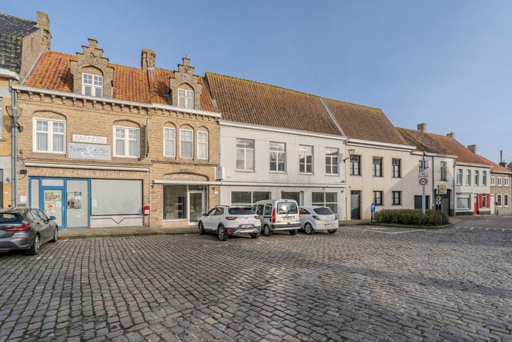 Residential property with commercial space in the center of