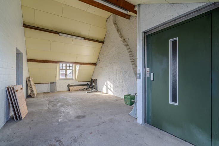 Residential property with commercial space in the center of