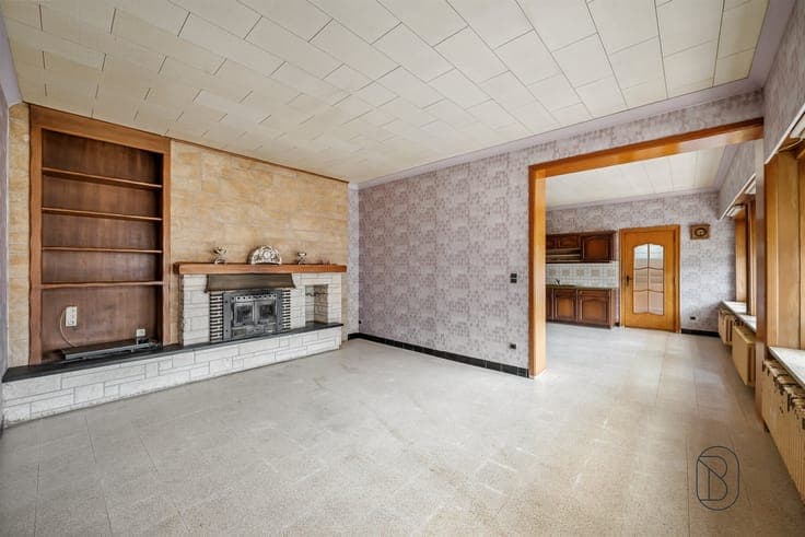 Spacious home in need of renovation with 4 bedrooms and a ga