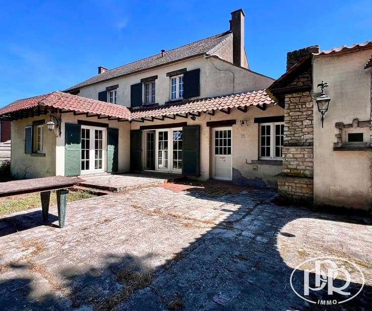 Lot of approximately 6 ares, garage, potential for 3 bedroom