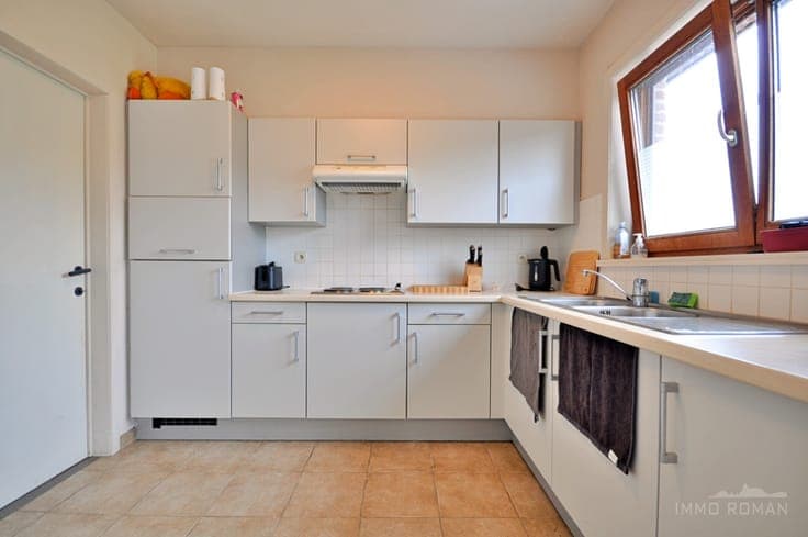 Instapklare woning met garage en uitweg te Kluisbergen!
