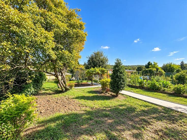 2-bedroom fully renovated house with garage and garden