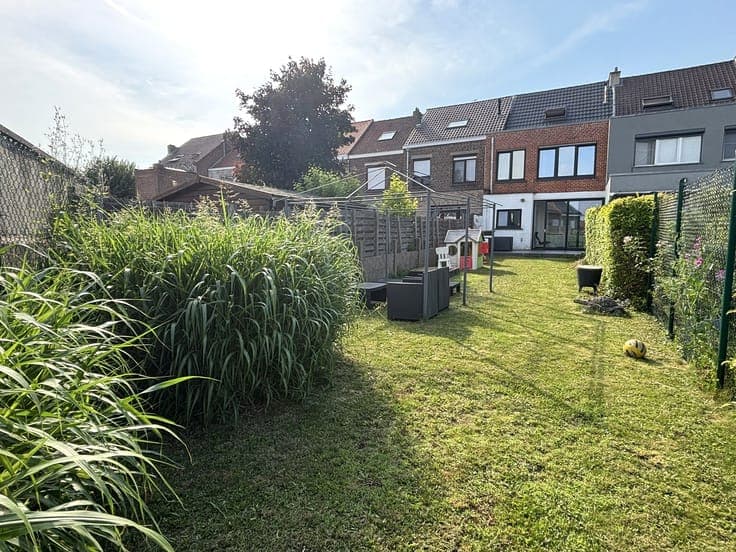 FULLY MOVE-IN READY house with garage and sunny garden