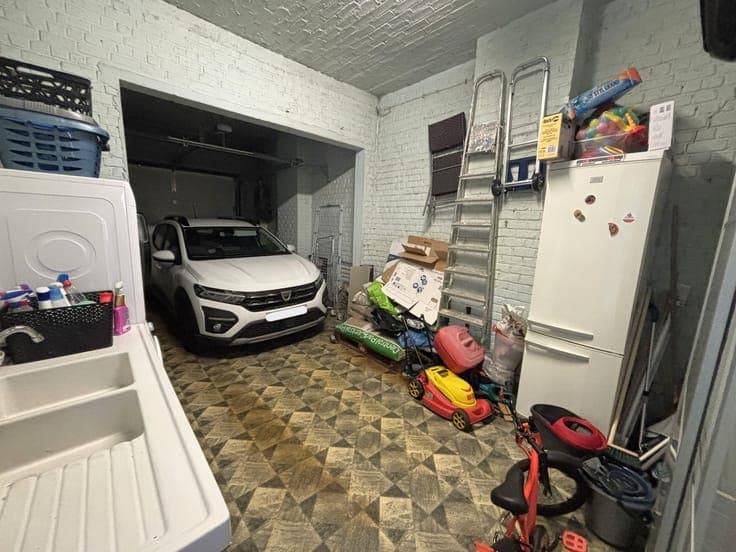 FULLY MOVE-IN READY house with garage and sunny garden
