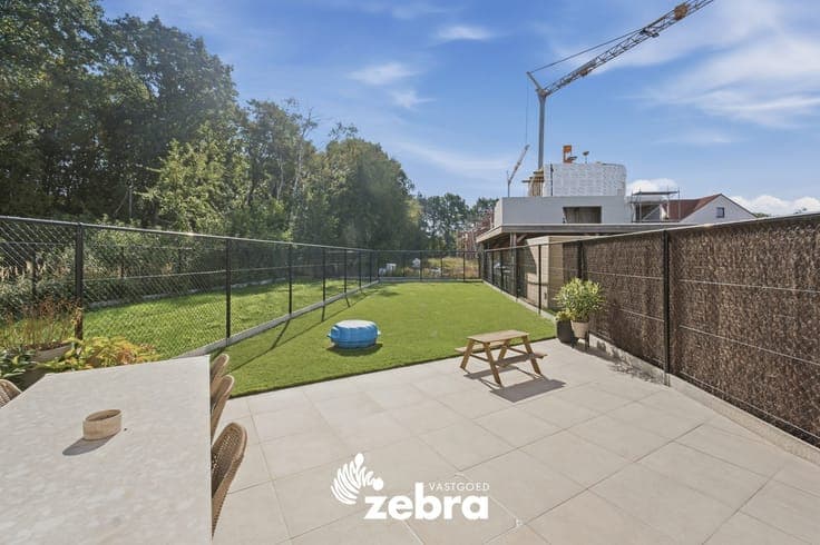 BEN-woning met zuidgerichte tuin en carport te Oostakker!