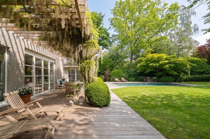 Charming property with pool and lush surroundings