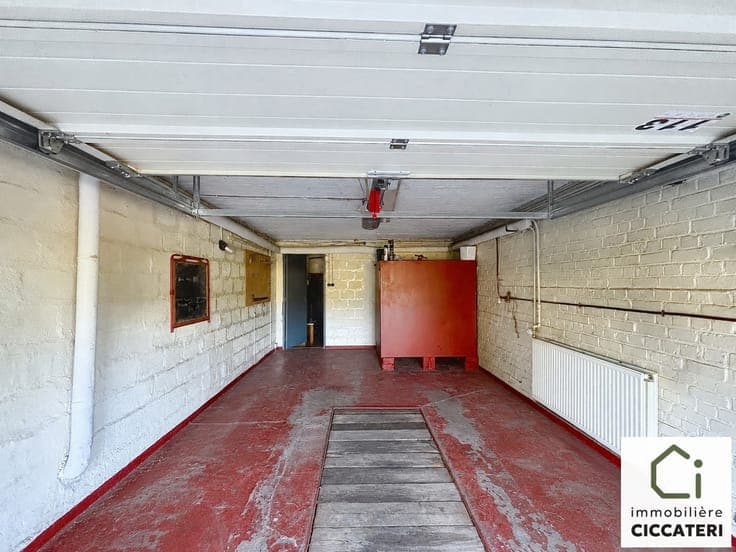 Semi-detached house with terrace, garden and garages in Flém