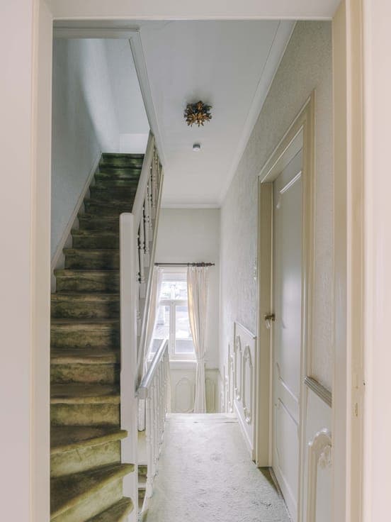 Verzorgde en ruime rijwoning met atelier in Sint-Niklaas