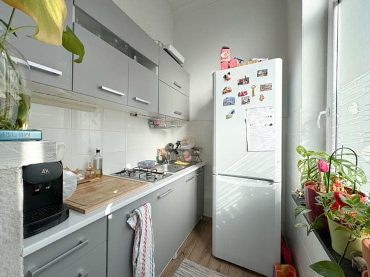 SINGLE-FAMILY HOUSE CONVERTED INTO 5 APARTMENTS