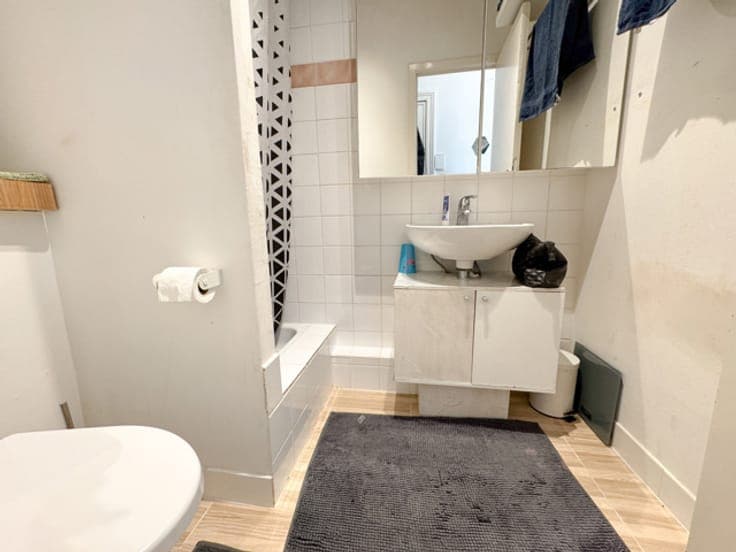 SINGLE-FAMILY HOUSE CONVERTED INTO 5 APARTMENTS