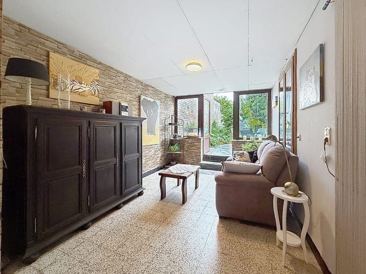 Maison 3 façades à toute proximité de la N25 et des commerce