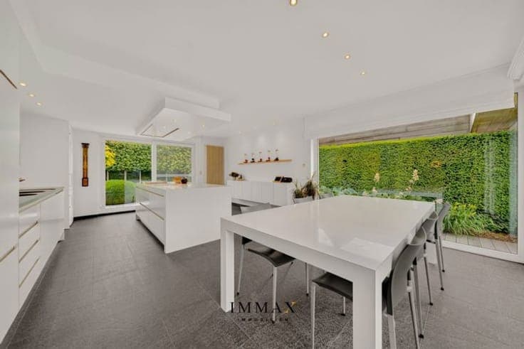 Exclusive living with swimming pool, surrounded by greenery