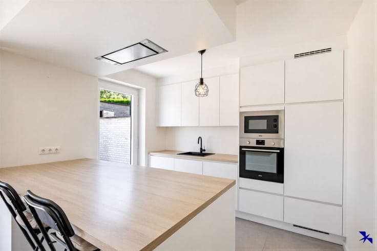 Move-in ready energy-efficient house with 4 bedrooms, garage
