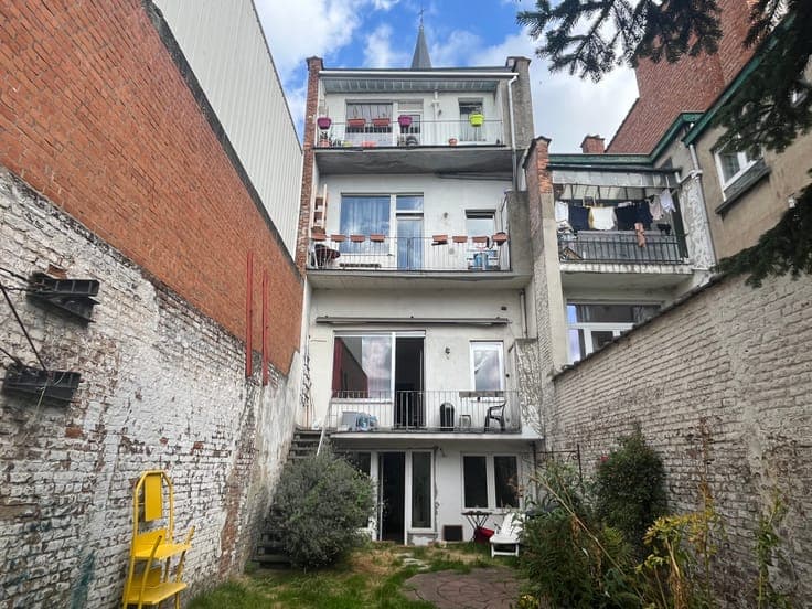 3-unit building with terraces and a southwest-facing garden