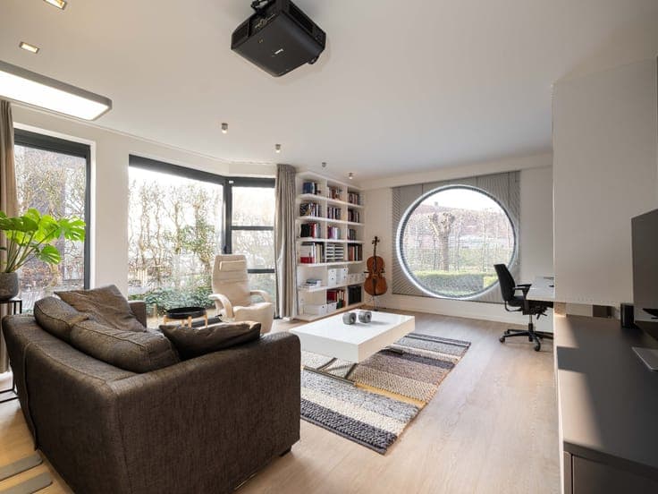 Spacious family home with pool near the center of Geel