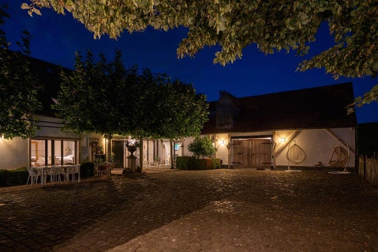 Unique, luxurious farmhouse with an indoor pool, spa, and go