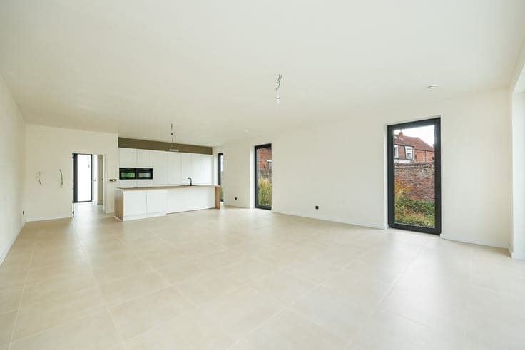 Semi-open-concept new-construction home with 3 rooms and a g