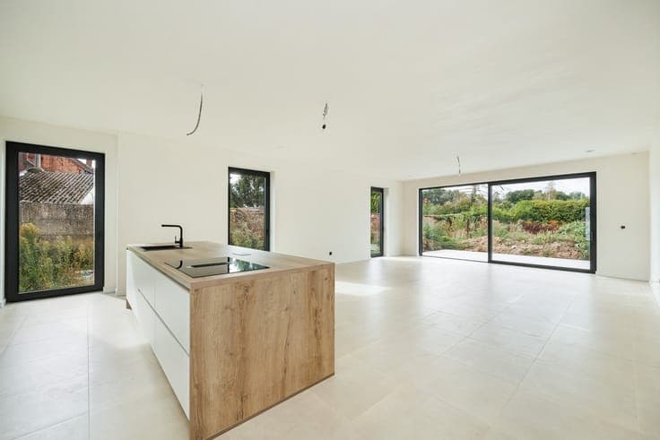 Semi-open-concept new-construction home with 3 rooms and a g