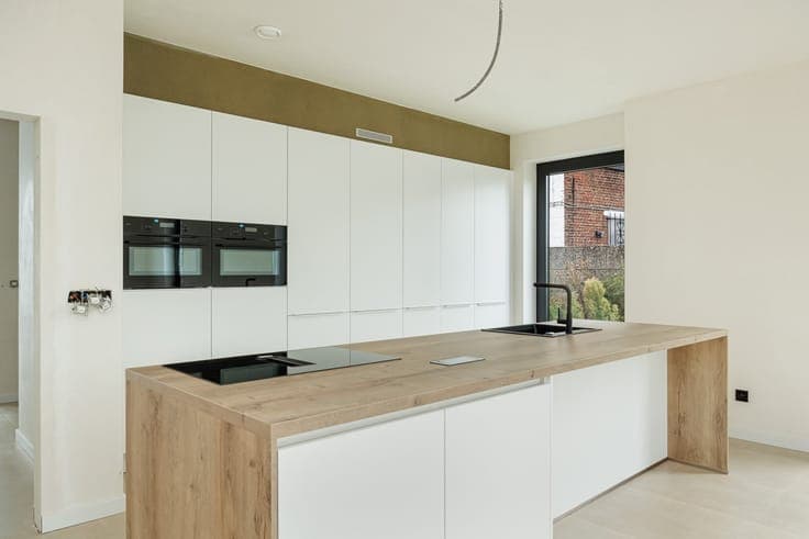 Semi-open-concept new-construction home with 3 rooms and a g