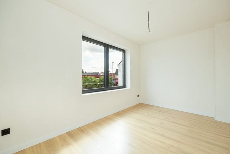 Semi-open-concept new-construction home with 3 rooms and a g