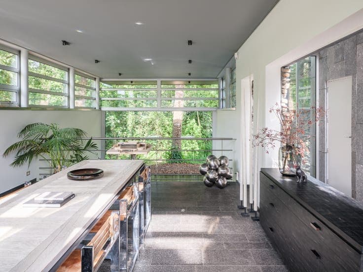 Vrijstaande architectenwoning (bvo 444 m²) op de grens me...