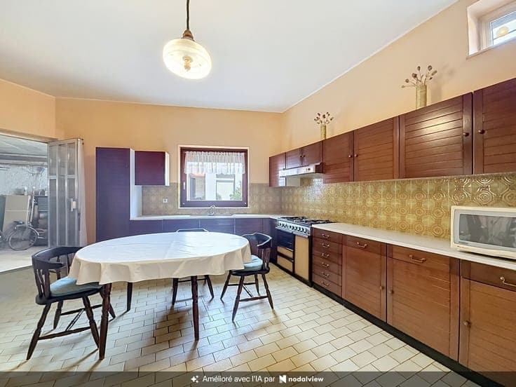Maison unifamiliale avec jardin et garage