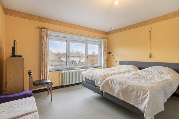 Energy efficient house with 3 bedrooms, garage and garden.