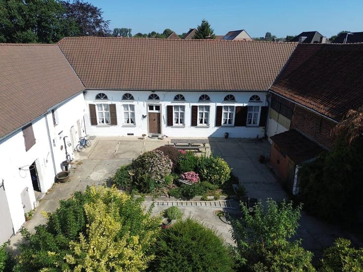 AN AUTHENTIC FARMHOUSE WHERE CHARM, PEACE, AND SPACE COME TO