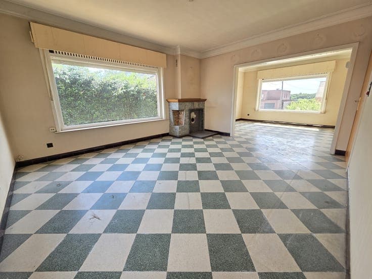 Vrijstaande woning met 4 slks op een perceel van 3135m² met