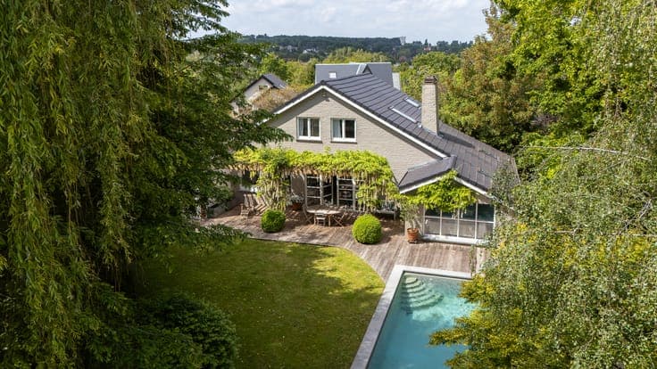 Charming property with pool and lush surroundings