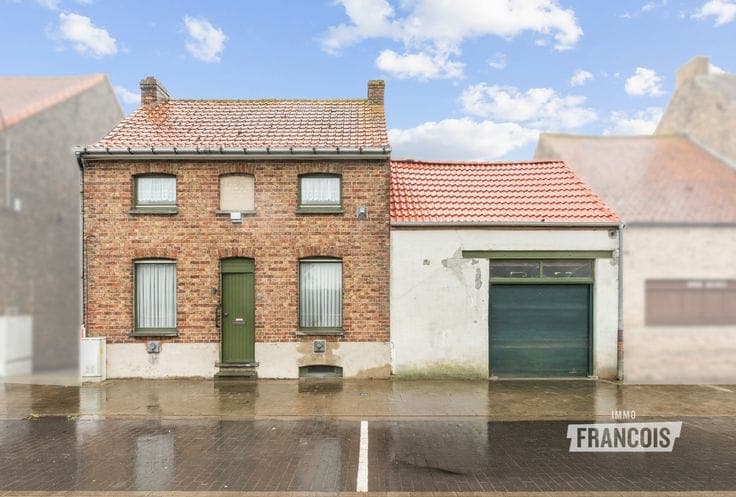 House with plenty of potential, garage and garden along the…