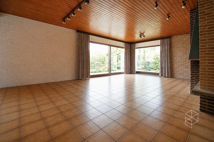 Centraal gelegen gelijkvloerse woning met royale tuin op ...