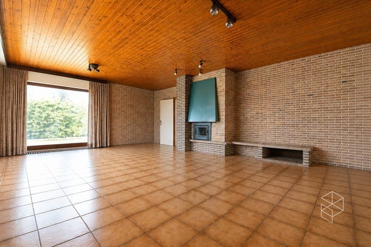 Centraal gelegen gelijkvloerse woning met royale tuin op ...